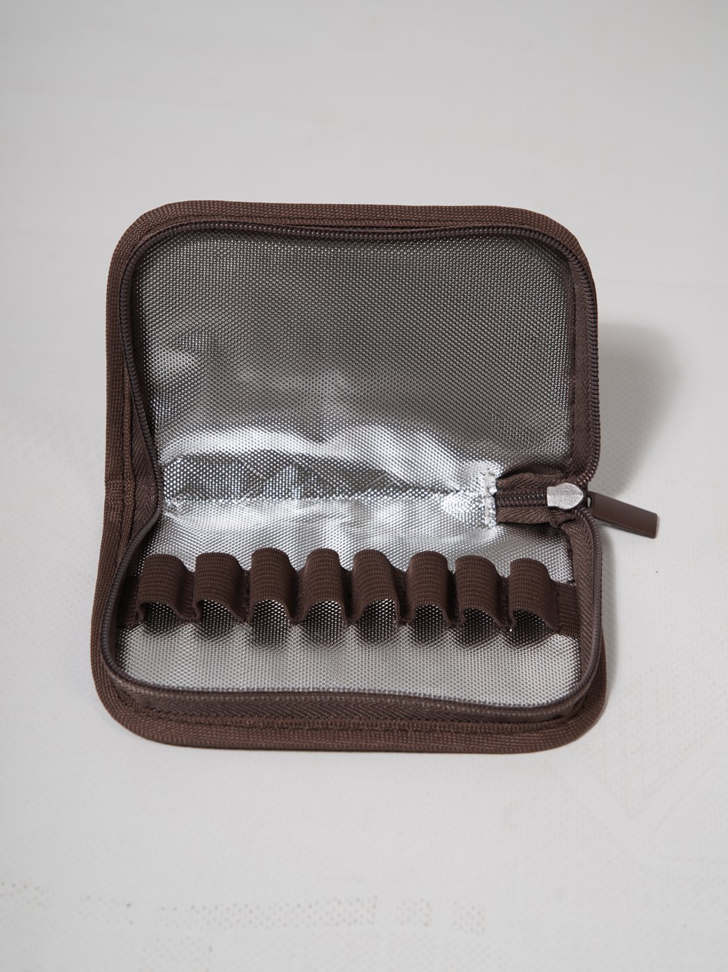 The Elixir cooling bag open - foil lining and the elastic loops that hold each vial upright