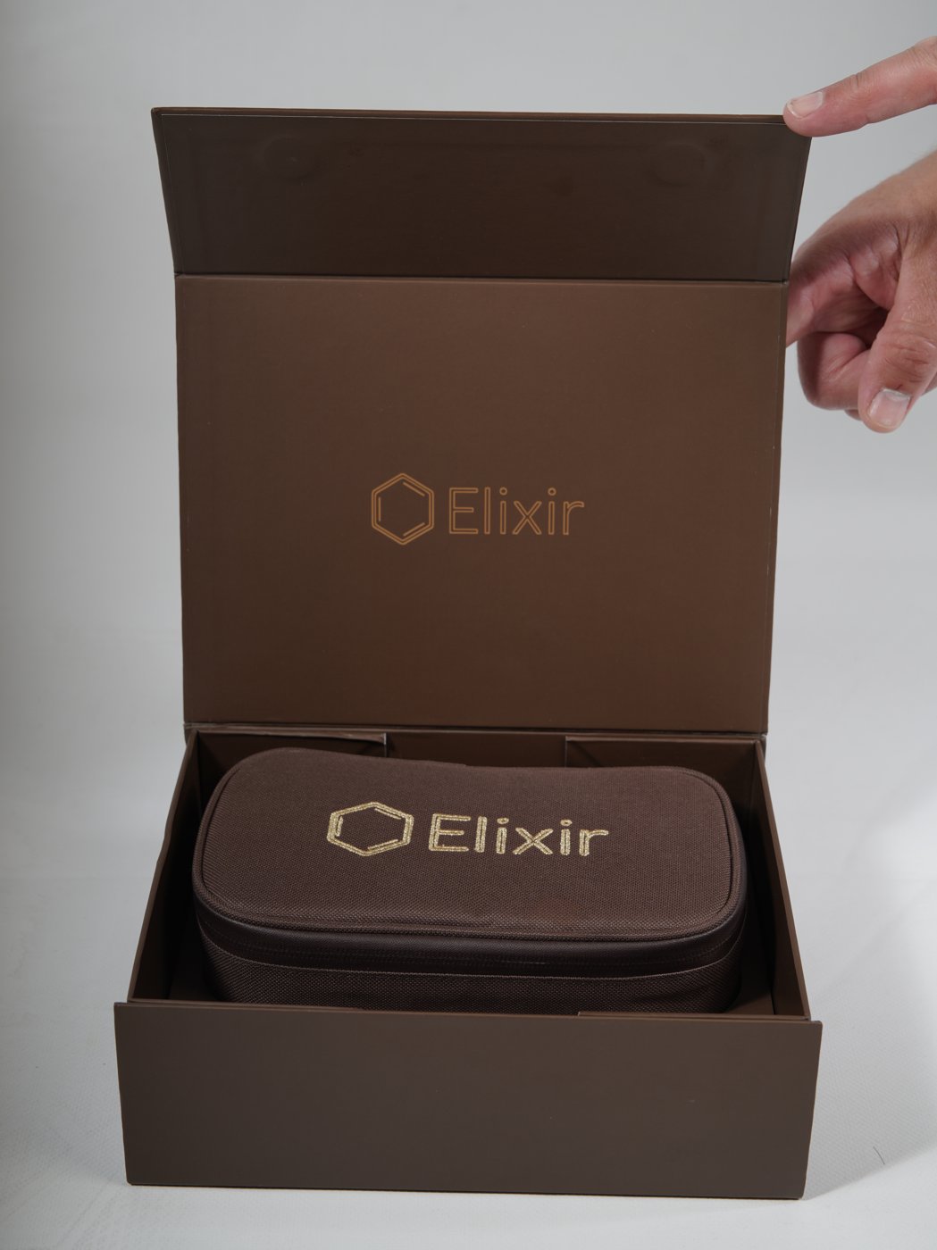 Opening the Elixir kit box, the zipped case seated inside