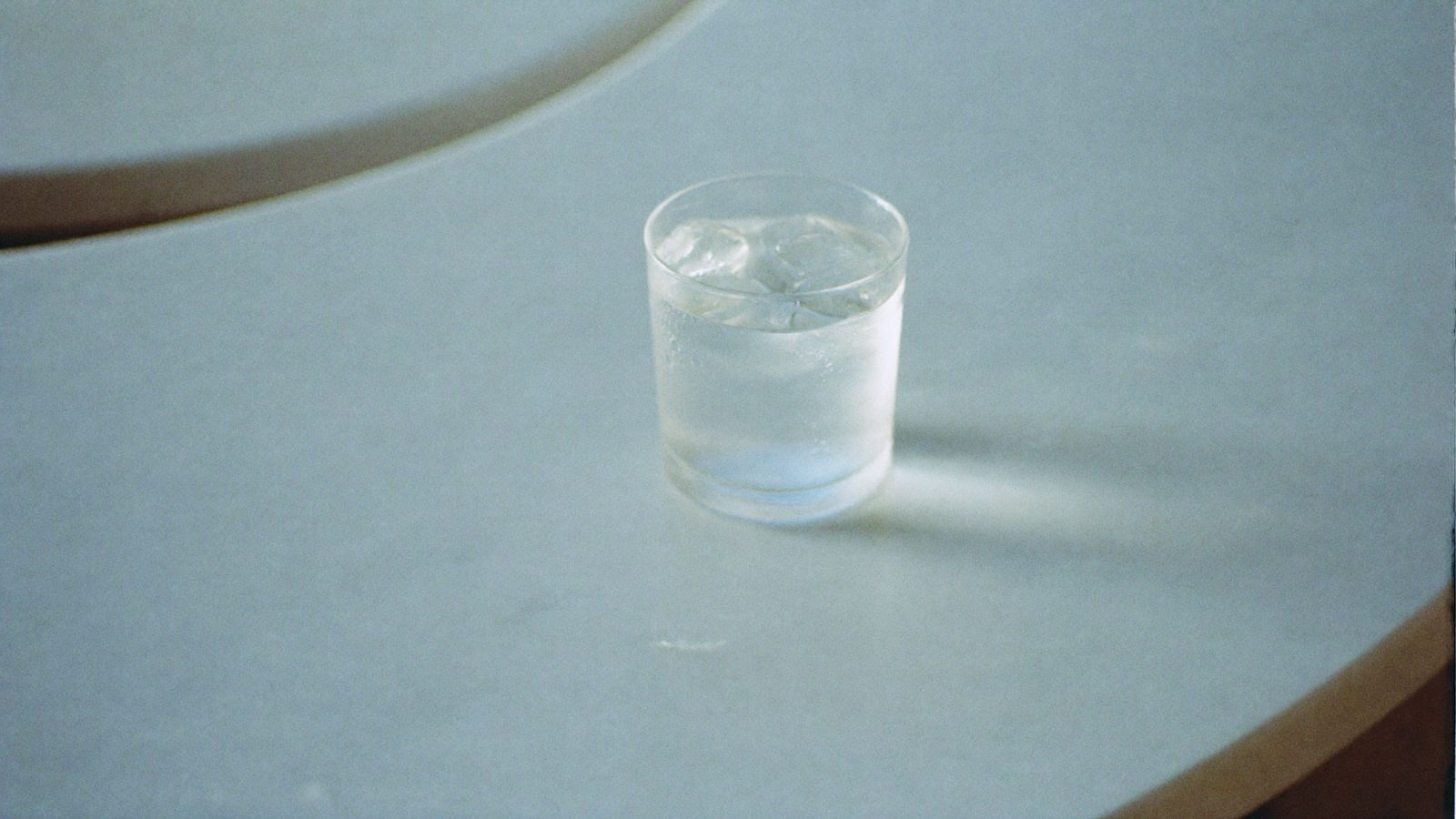 A cool, iced still-life evoking the Elixir cold chain