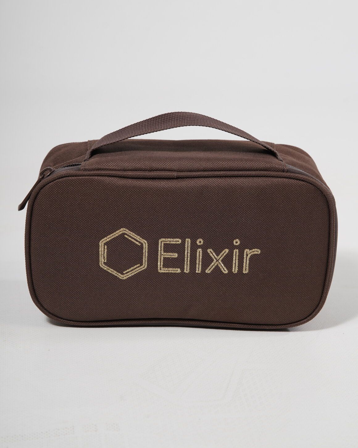 The Elixir Case — insulated bag with the gold mark