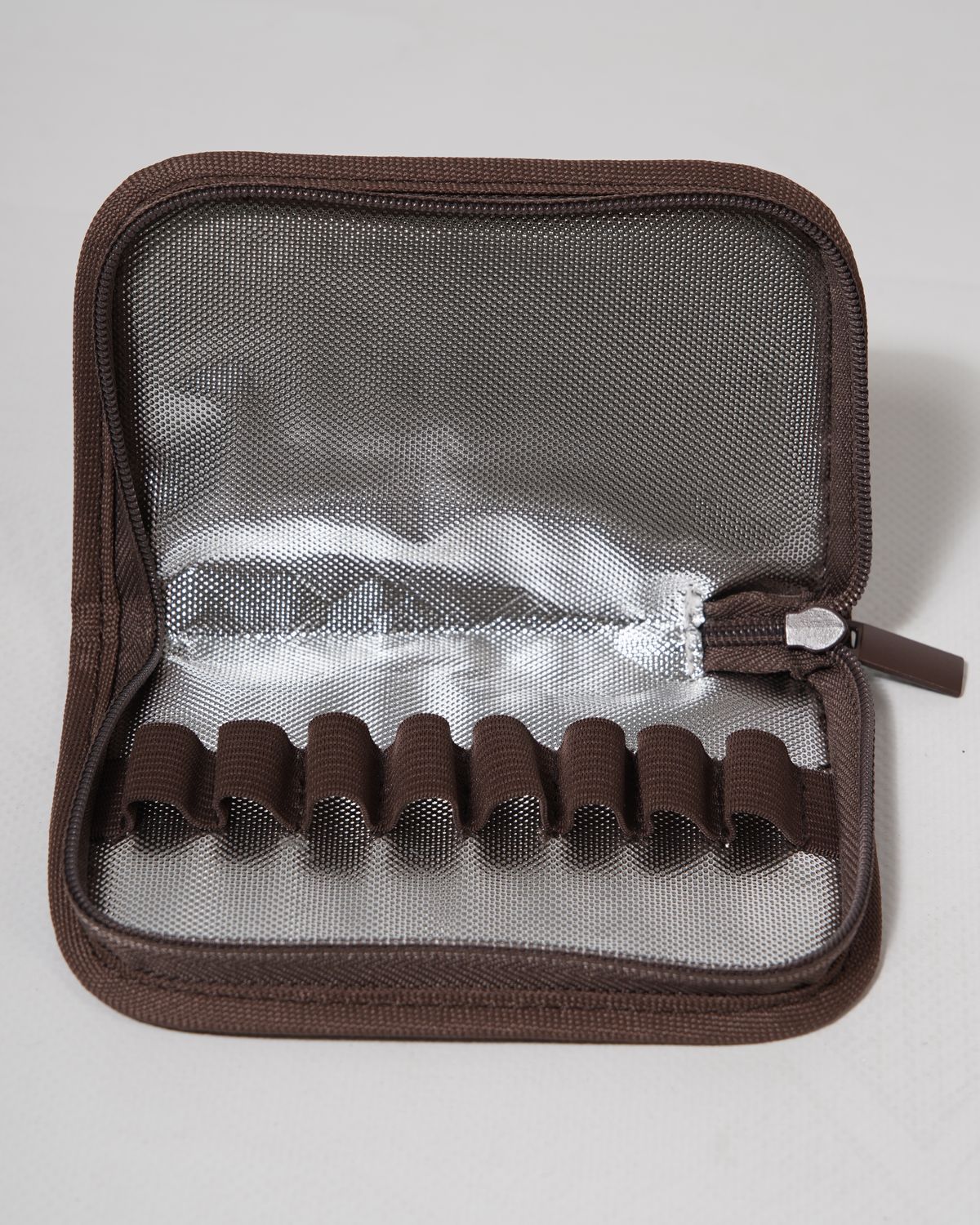 The Elixir Cooling Bag open — foil lining and elastic loops that hold each cartridge upright